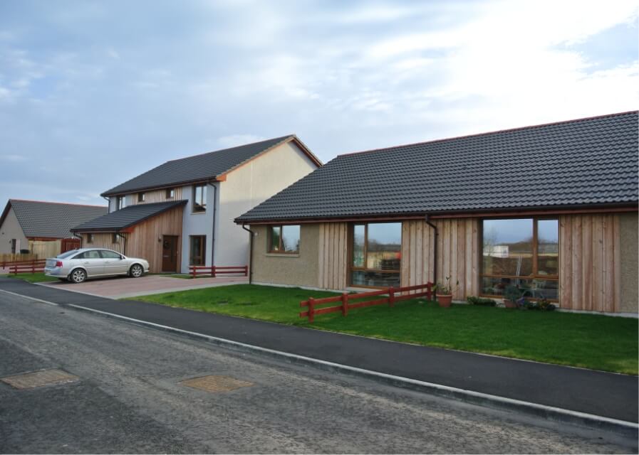 A photo showing affordable mixed housing on a street