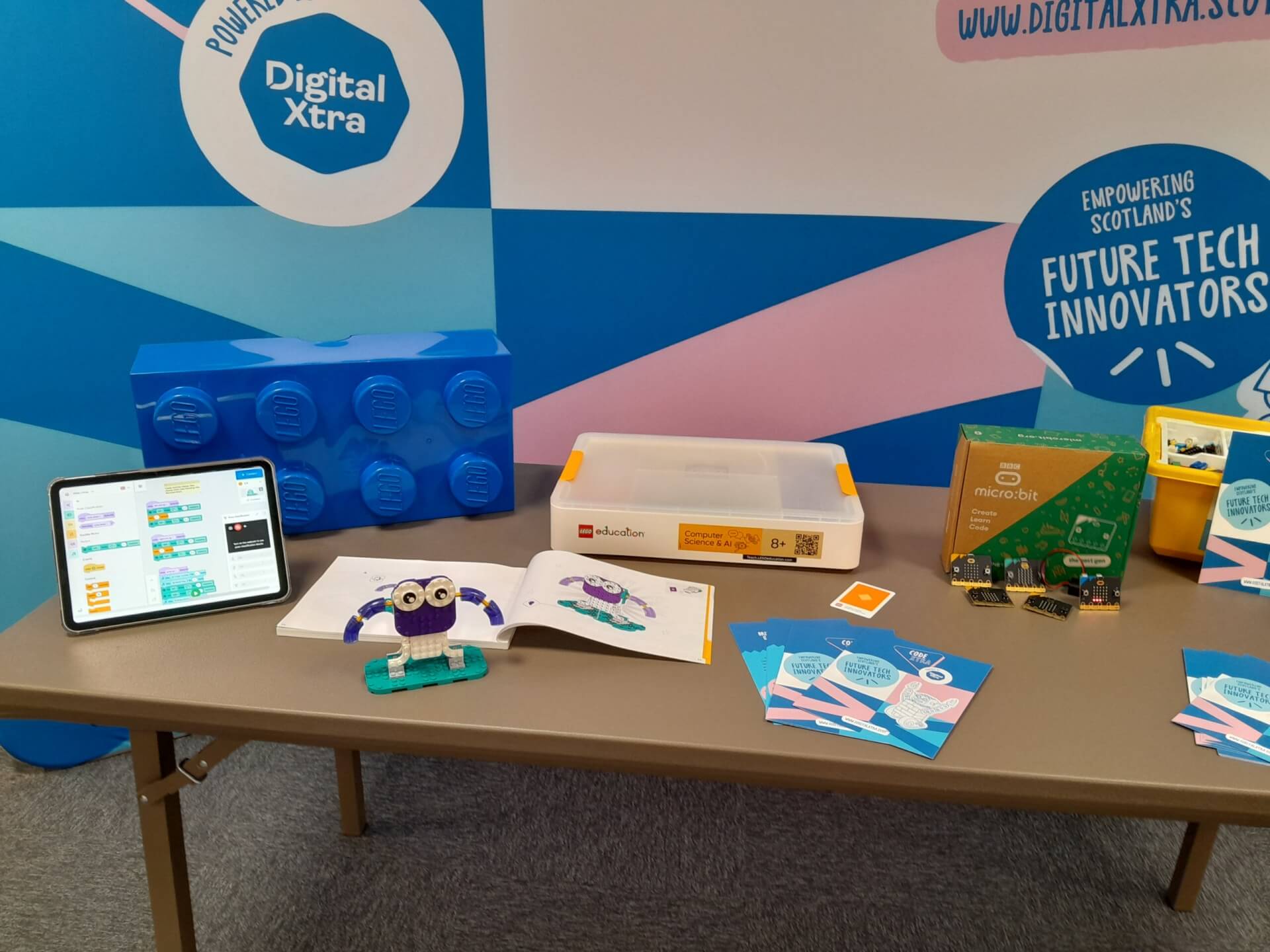 Table set up with Lego and coding kits for STEM skills
